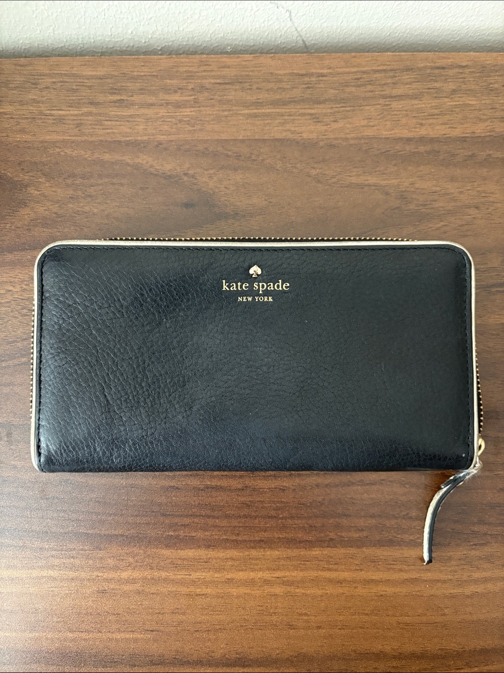 kate spade black leather zip-around continental wallet with gold logo